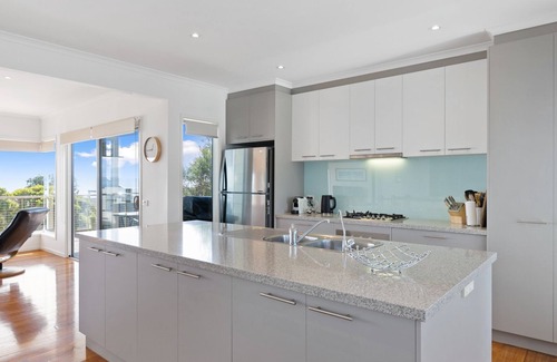 Ventnor House | Wake up to panoramic ocean views every day in this beautifully designed coastal haven, where comfort