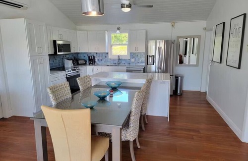 Discovery Bay Villa | Waterfront 5BR Home w/Pool, Gated Parking & Prime Location!