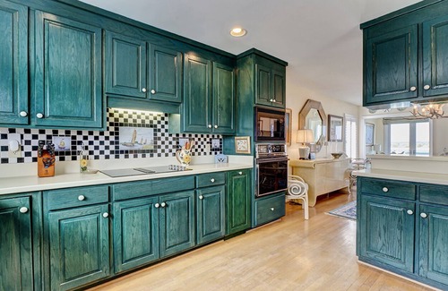 South End House | Waterfront 5 BR home w/incredible views, dock, boat slips, & elevator!