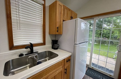 Eau Claire House | Waterfront cottage. Legacy farm Retreat.