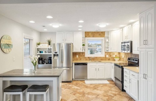 Colington Harbour House | Waterfront! Game Room, Hot Tub,Theater Room, Kayaks, SUPs, FirePit, YMCA! DogsOK