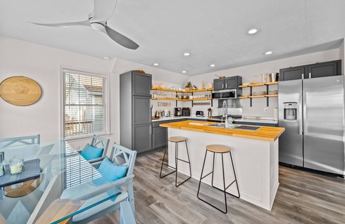 Colington Harbour House | Waterfront home and Oasis with private dock, outdoor bar and firepit