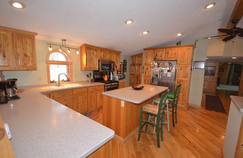 Interlochen House | Waterfront home in Lake Ann with outdoor pool. Pet ok, row boat, kayak, canoe