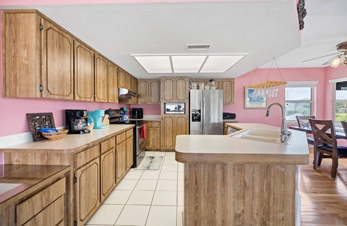 Spring Hill House | Waterfront Home with Heated Pool+Game Room