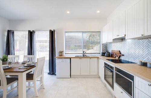 Chain Valley Bay House | Waterfront Lake House with Hot Tub & Granny Flat