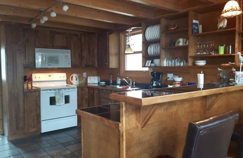 Glovertown Ski Chalet | Waterfront log chalet. The perfect getaway, a hidden gem.