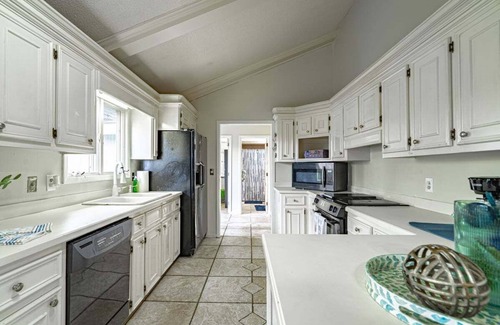 Florence House | Waterfront Paradise with Golf Course Views