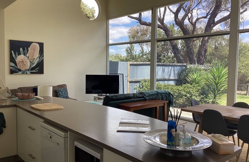 Banksia Peninsula House | Waterfront Property with Private Jetty in Bushland Setting