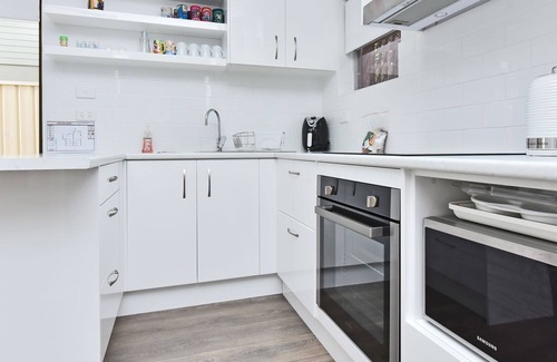 Corlette Apartment | Waterfront Reflections