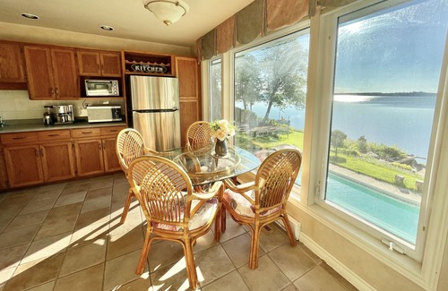 Valentia House | Waterfront Sunrise bungalow w/Swimming Pool