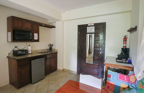 Placencia Villa | Waterside tranquility with roof-top pool. "Garden Suite" - 2 bedroom/1 bathroom