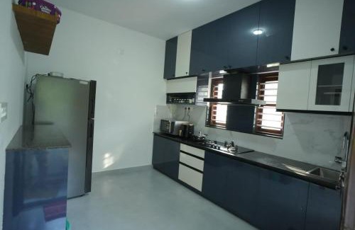 Sulthan Bathery Apartment | Wayanadan Huts Homestay