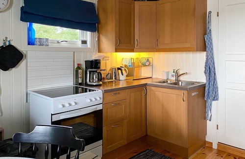 Smøla House | Welcome to the island of Smøla and this charming cottage on a sheltered and quiet bay.