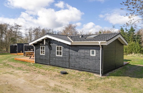 Fur House | Welcome to this inviting vacation home with attractive outdoor areas!