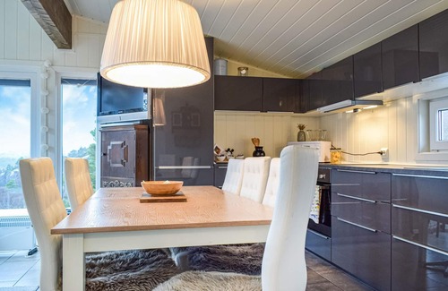 Spangereid House | Welcome to this quality holiday home with great mountain views.