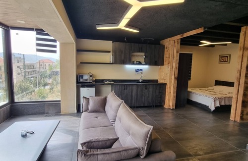 Kfardebian Ski Chalet | Welcoming 1-bedroom chalet in Faraiya with stunning mountain viewswith Cheminée