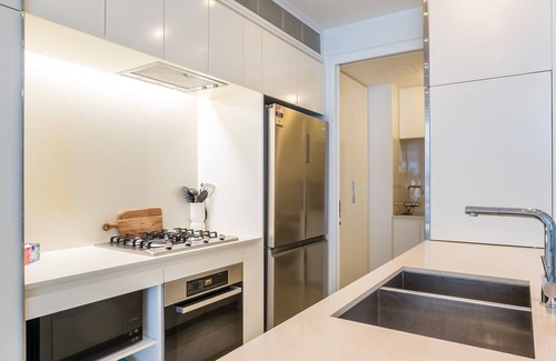 West End Apartment | West End Getaway - Heated Pool!