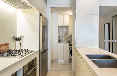 West End Apartment | West End Getaway - Heated Pool!