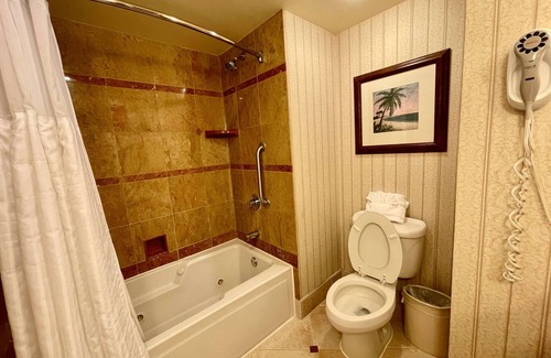 Chinatown Hotel | Westchase Escape with Breakfast, Outdoor Pool, and Quick Drive to CityCentre