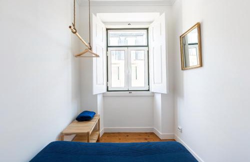 Alfama Apartment | White & Blue Vintage Home in Graça