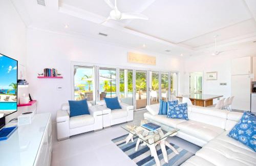 Breakers House | White Cottage by Grand Cayman Villas & Condos