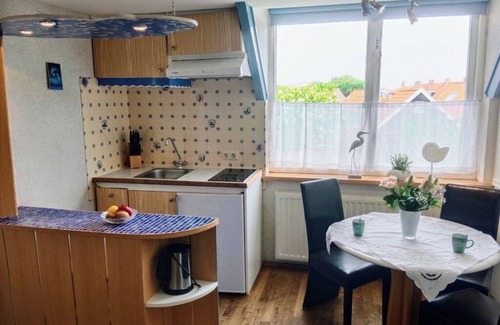 Westkapelle Apartment | Window view of the dunes! 10% weekly discount between September and December!