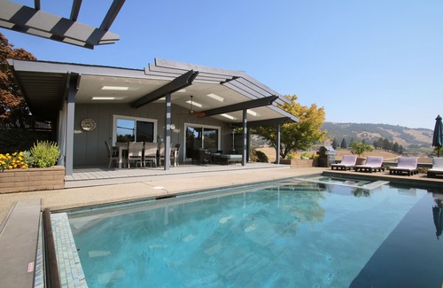 Riebli-Wallace Neighborhood Group House | Wine Country Retreat with Pool, Vineyard, Trampoline, Putting Green and Hot Tub