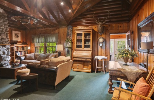 Antioch House | wonderful log home Chain o Lakes waterfront home with pier Monthly rental