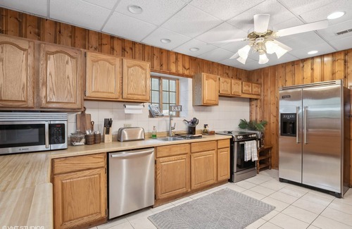 Antioch House | wonderful log home Chain o Lakes waterfront home with pier Monthly rental