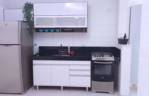 Jardim Centenario Apartment | Wonderful view of Enseada Beach. Gourmet and Pet Friendly Balcony