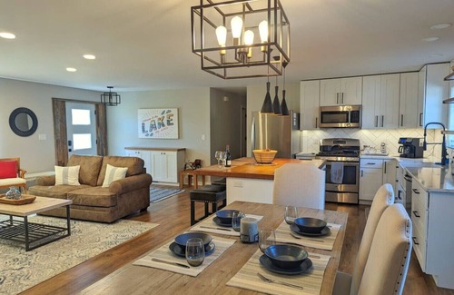 Wausau House | Wooded waterfront retreat with hot tub & fire pit