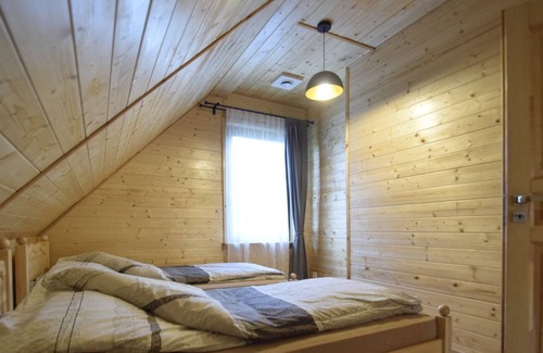gmina Osiek House | Wooden Holiday Home in Skrzynia with Terrace