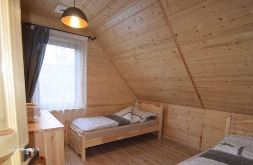 gmina Osiek House | Wooden Holiday Home in Skrzynia with Terrace