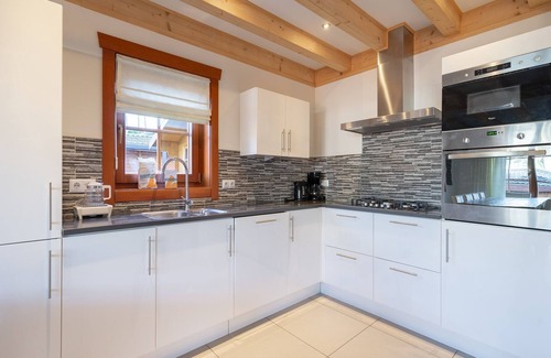 Langeberg House | Wooden holiday home with microwave