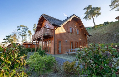 Langeberg House | Wooden holiday home with microwave