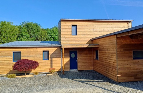 Tregomeur House | Wooden house between land and sea