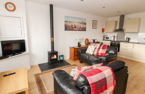 Ivegill Cottage | WOODPECKER, pet friendly, with open fire in High Head Castle Farm