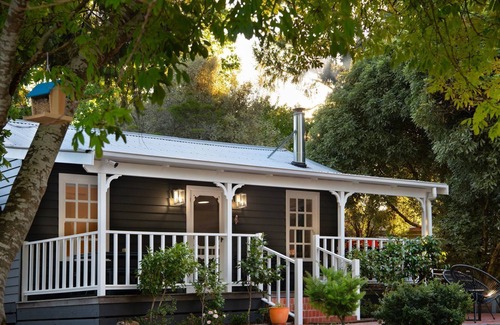Daylesford House | Wrenwood Cottage 2 bedroom miners cottage with wood fire, 6 seater outdoor spa and 2 person indoor s