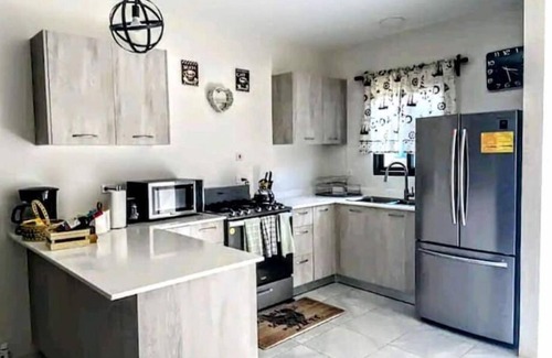 Discovery Bay House | Wynter'sEscape! 2BR w/pool & beach access near PuertoSeco Beach! w/24-hrsecurity