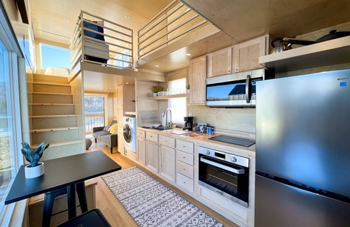 Pear Park House | XL tiny home with two lofted queen beds and full size futon on the main level.