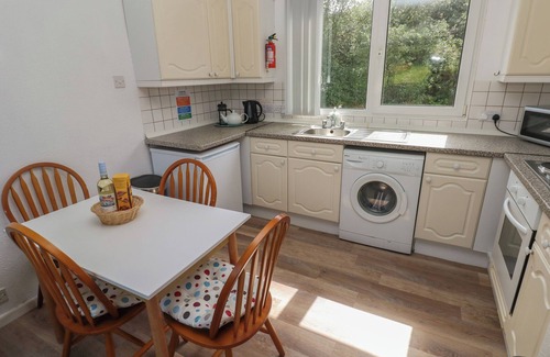 Nolton Cottage | Y TWLL BOLLT (THE BOLT HOLE), pet friendly in Nolton Haven