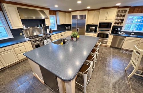 Hague House | Year-Round River Escape with Beach & Indoor Heated Pool, Hot Tub and more!