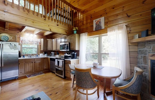 Newport Cabin | Yellow Cabin on the River: Pet Friendly, Free Attraction Tickets, Hot Tub & River Access
