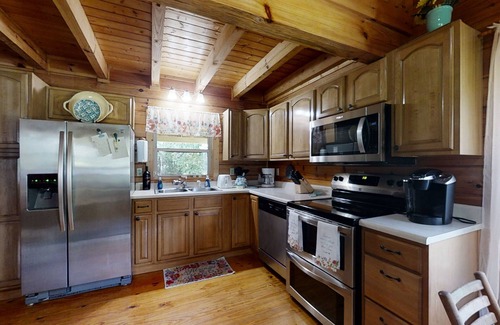 Newport Cabin | Yellow Cabin on the River: Pet Friendly, Free Attraction Tickets, Hot Tub & River Access