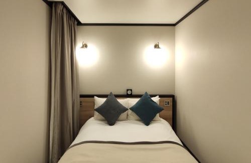 Nishi-Shinjuku Hotel | yksi SAUNA & STAY