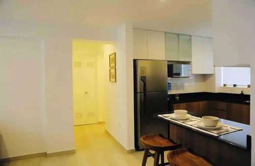Santa Cruz Apartment | Your Malecon Haven: Air C , Heat & Nearby Eats.