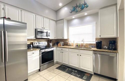 South Bradenton House | Your Tropical Paradise with heated saltwater pool
