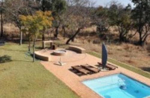 Leeupoort Villa | Zebula Golf and Wildlife Estate - Squirrel Pandemonium Pax 12 - Moi Signature Luxury villa