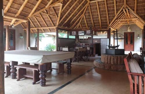 Leeupoort Villa | Zebula Golf and Wildlife Estate - Toktokkie Knocking Pax 20 - Moi Signature Luxury villa