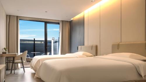 云泊夜酒店浦东机场店Yunboye Hotel PVG Airport Disneyland Free Shuttle